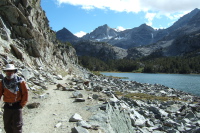 Frank returns past Long Lake.