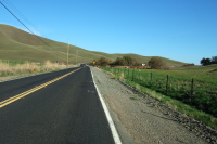 The greening hills along Highland Way.