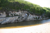 Kay negotiates the trail above the foul pool.