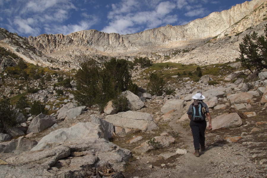 Stella leads the way up to the large cirque below the cliffs.