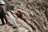 Bill downclimbs the crux of the climb.