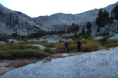 Frank and Stella using their sticks on the descent through Hall Valley