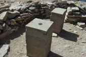Two concrete pillars, one with a USGS marker.