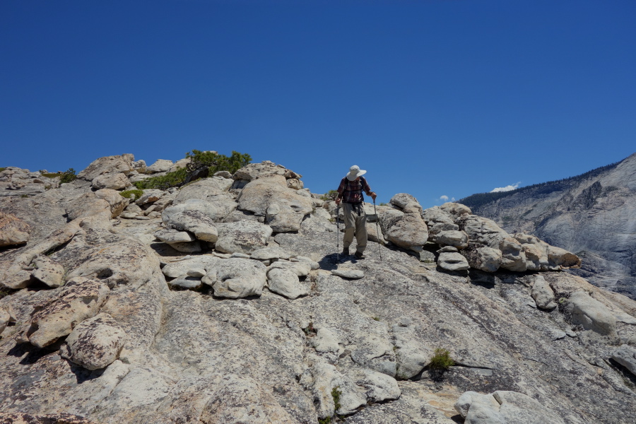 David makes his way cautiously to the edge of the south summit.