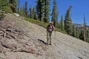 David descends a steeper section of trail.