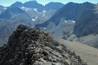 Stella waits below the summit.
