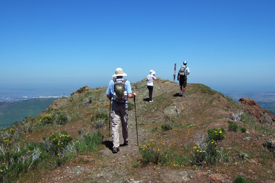 Piaw, Xiaoqin, and Bill approach the summit of Mt. Olympia.