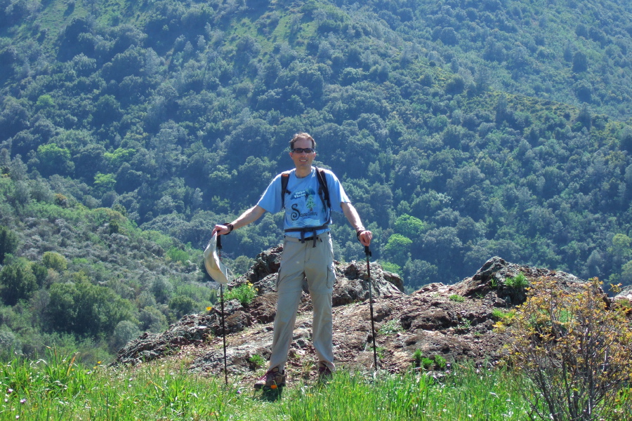 Bill B. stands at a rock outcropping on Bald Ridge.