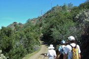 Hikers approach the summit of North Peak.