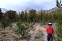 Frank, Stella, and David descend the final mile through the valley.