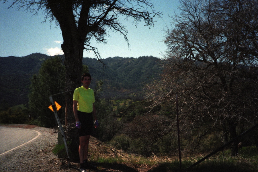 Bill at the last summit before the climb up Copernicus Peak (in background left)