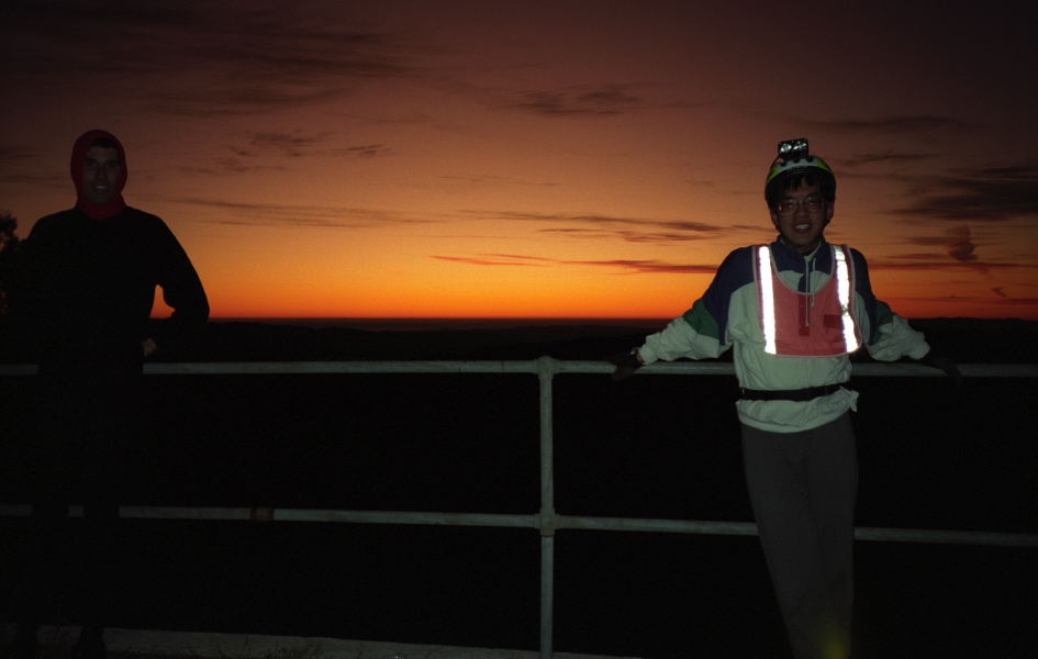 Bill and Paul Liu stand at the railing.