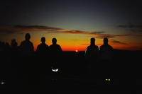 Group photo on the Mt. Hamilton summit as the sun makes its appearance.