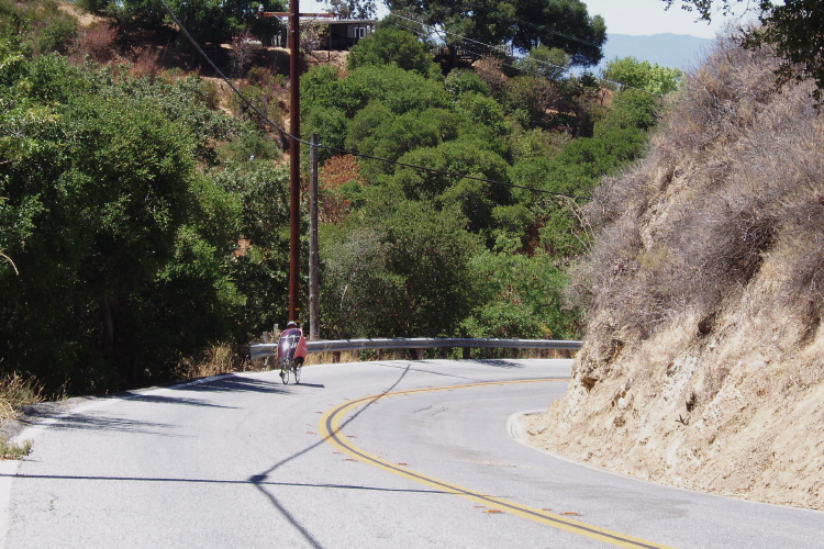 Ron climbing up Clayton Rd. out of Flint Creek Canyon.