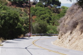 Ron climbing up Clayton Rd. out of Flint Creek Canyon.