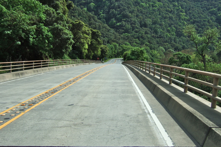 Continuing across the narrow bridge