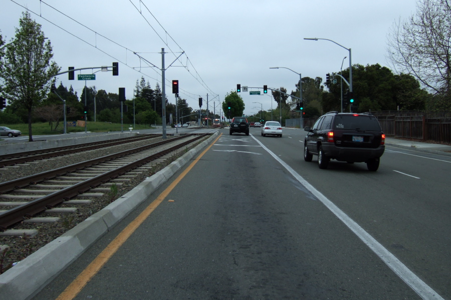 Preparing to turn left across the light-rail tracks onto Penitencia Creek Rd.