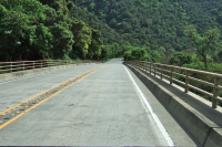 Continuing across the narrow bridge