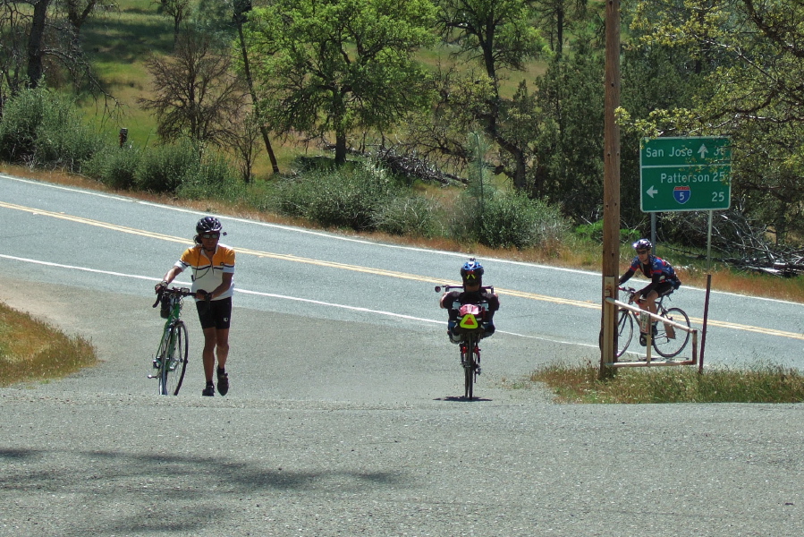Tim presses on while other riders arrive.