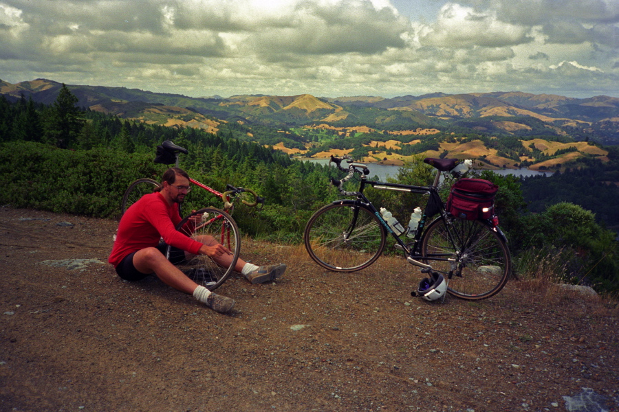 Richard fixes his flat tire.