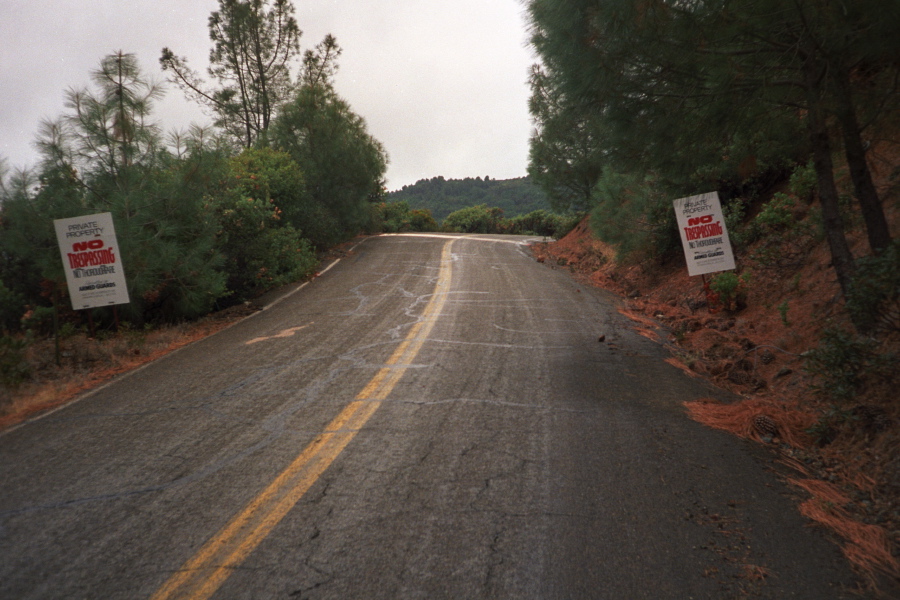 Nasty signs on Mt. Umunhum Rd.