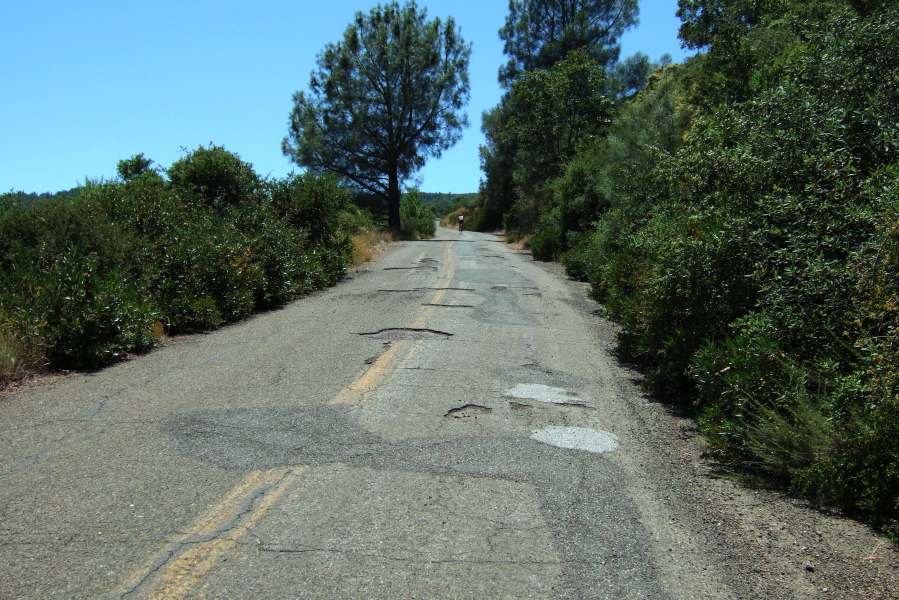 Climbing up the potholed road.