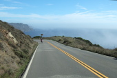 Ron Bobb climbs a hill on CA1 near Stinson Beach.
