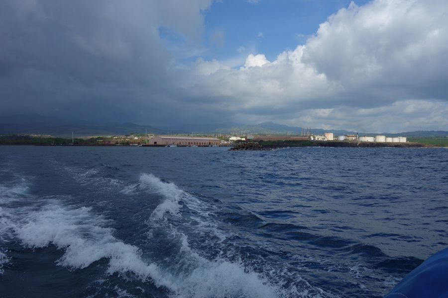 We speed away from Port Allen while clouds enshroud the higher points on the island.