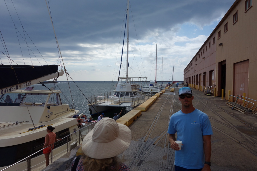 Other tour boats are lined up along to dock, preparing for their afternoon tours.