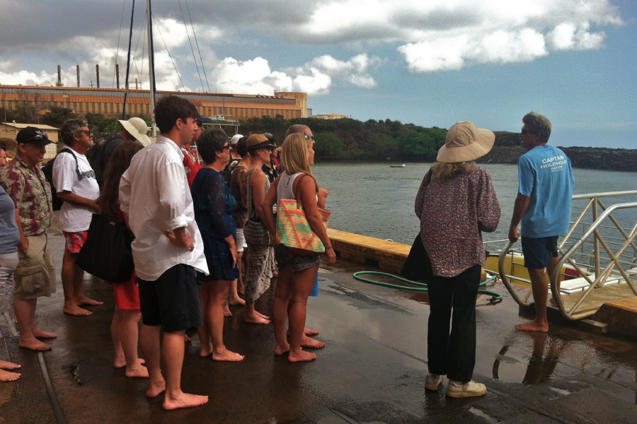 Kay and everyone else get ready to board the HoloHolo catamaran.