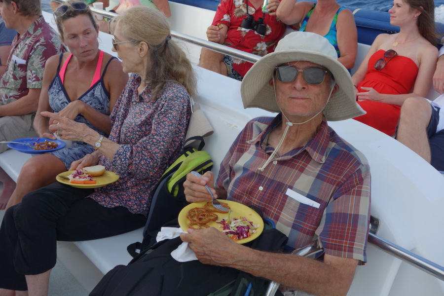 Laura, Kay, and David enjoy their meals.