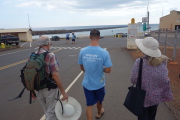 Kay and David speak with a crewmember.