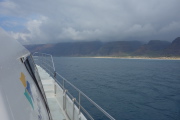 We cruise north past Polihale Beach toward Napali Coast.