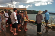 Kay and everyone else get ready to board the HoloHolo catamaran.