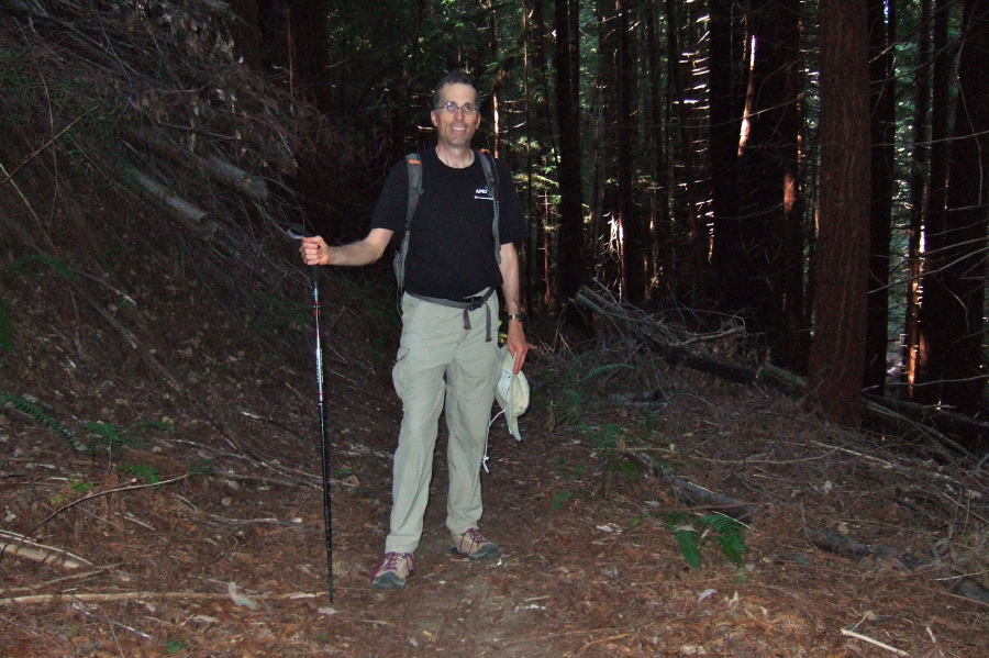 Bill on the trail as it enters the forest on the lower slopes.