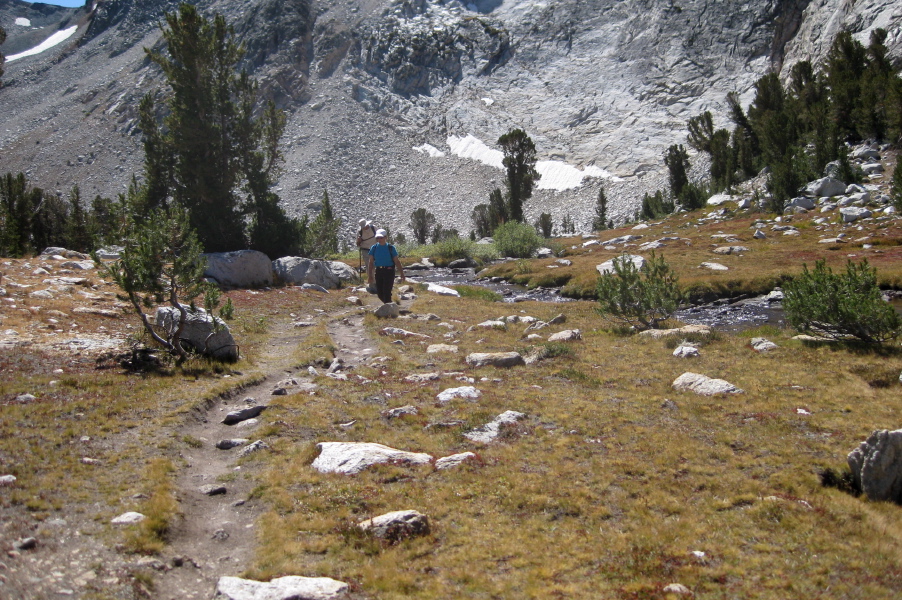 David and Stella walk on the easy section of trail.