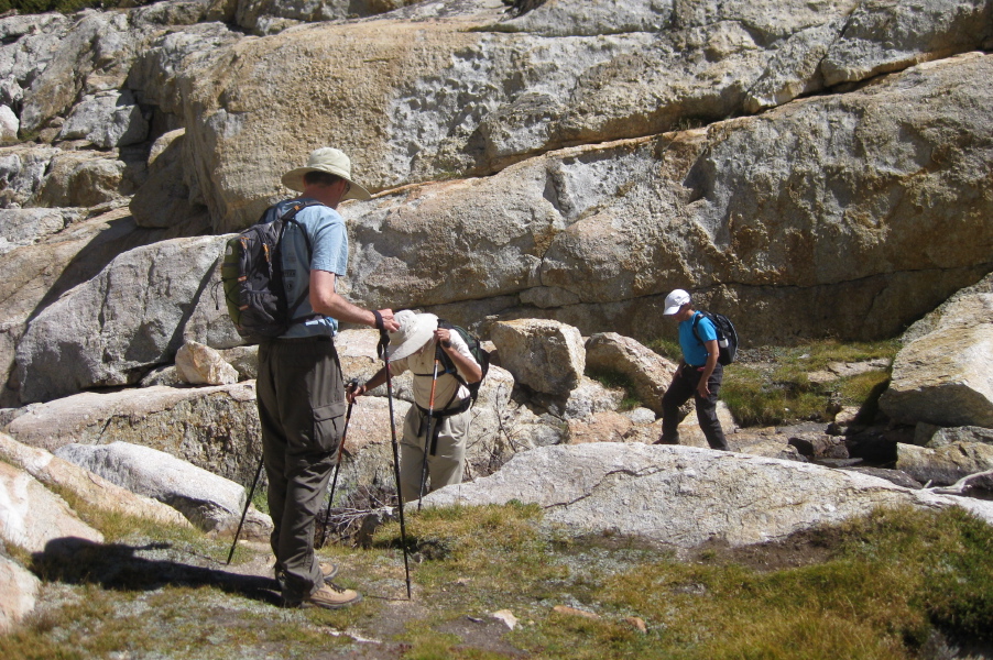 Bill watches everyone cross the stream at the top of the canyon.