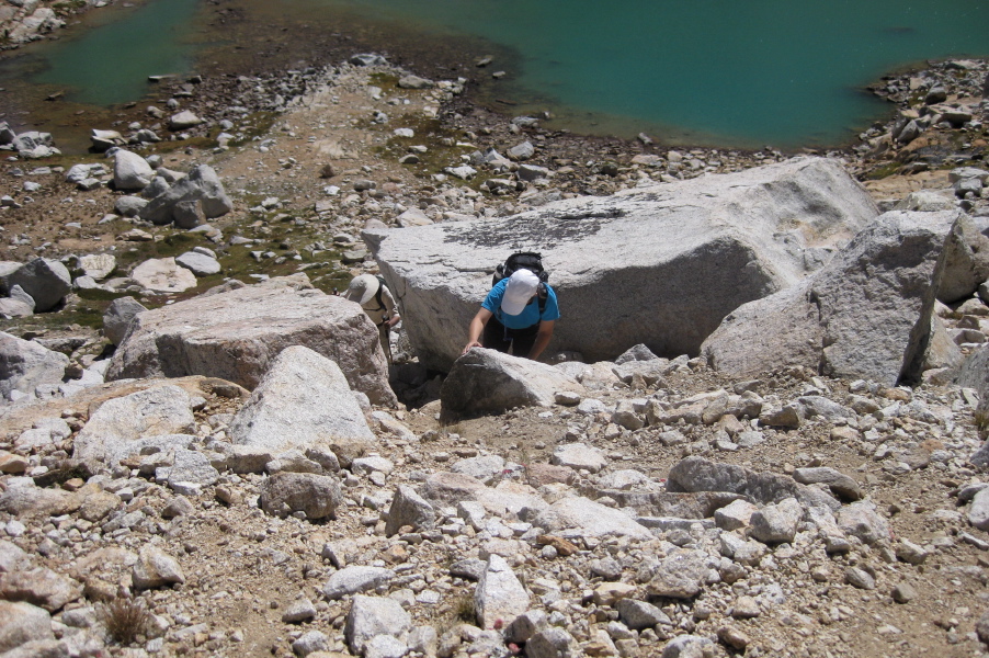 Walking through the crack in the rocks at the start of the climb to North Peak.