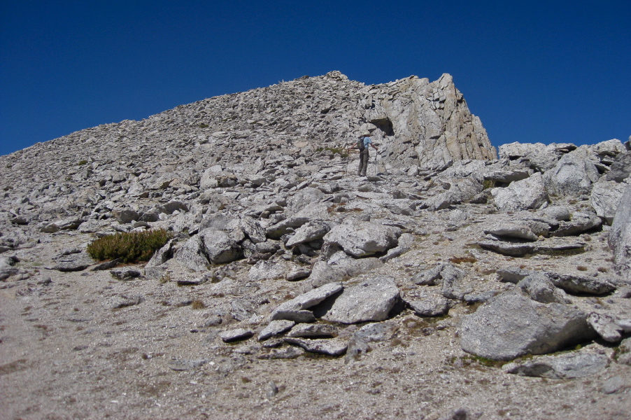Bill starts up the rocky part to the summit.