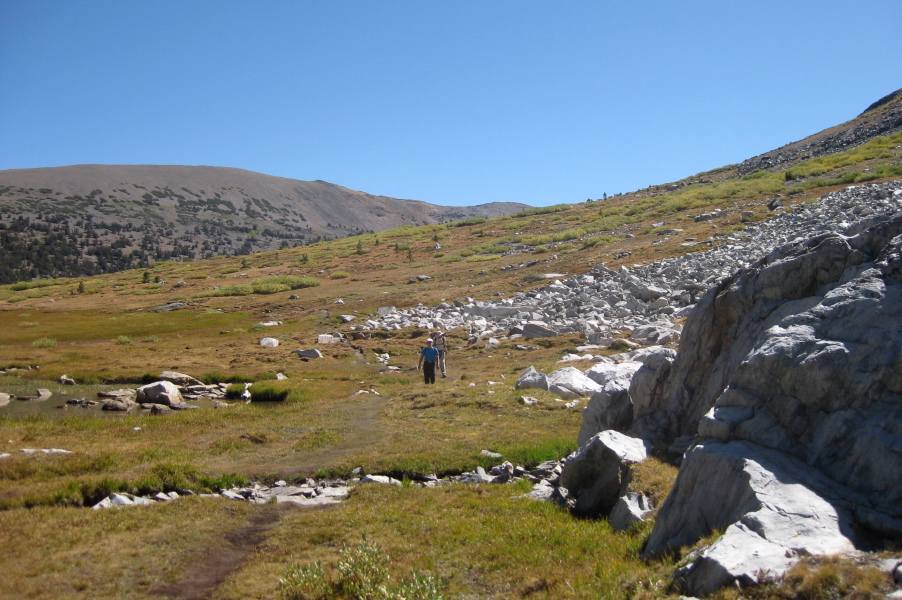 Stella and David hike the use trail on the south side of Greenstone Lake.
