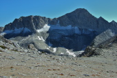 Mt. Conness (12590ft) looms over the low point on North Peak's southeast ridge where the route descends.