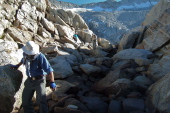 Frank, Stella, and David return down the same canyon.