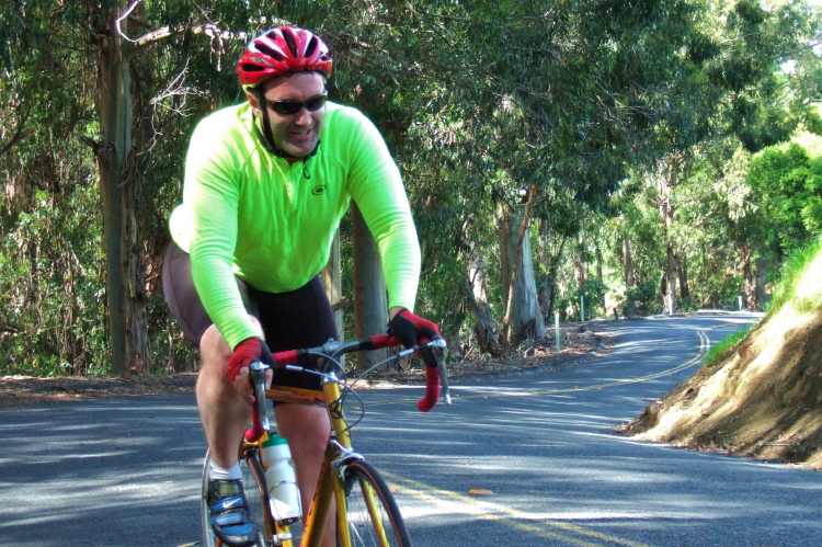 Mike climbs to the top of McEwen Rd.