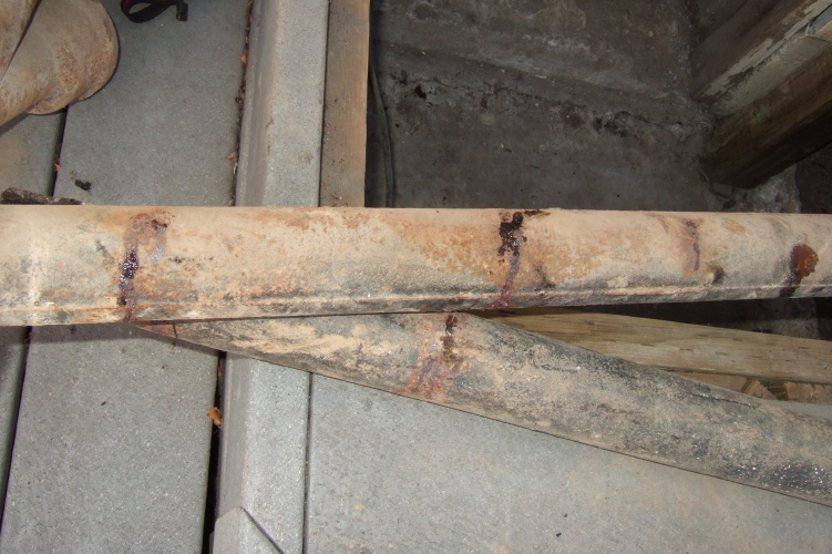 If your cast-iron pipes starting weeping like this on the outside, they're probably ready to be  replaced.