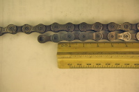 Old (top) and New (bottom) chains at 0 inches