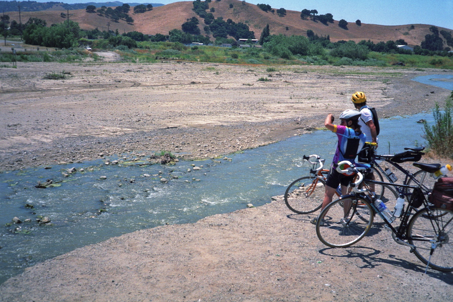 Stella and John stand at the brink.