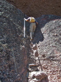 David starts up the second steep stairway.