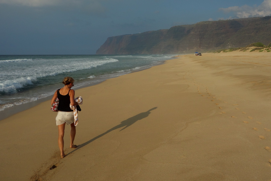 Laura marches north along the beach.