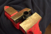  Assembling the mid-drive: Freewheel remover in vise.