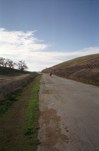 Ron coasts down into Quien Sabe Valley.